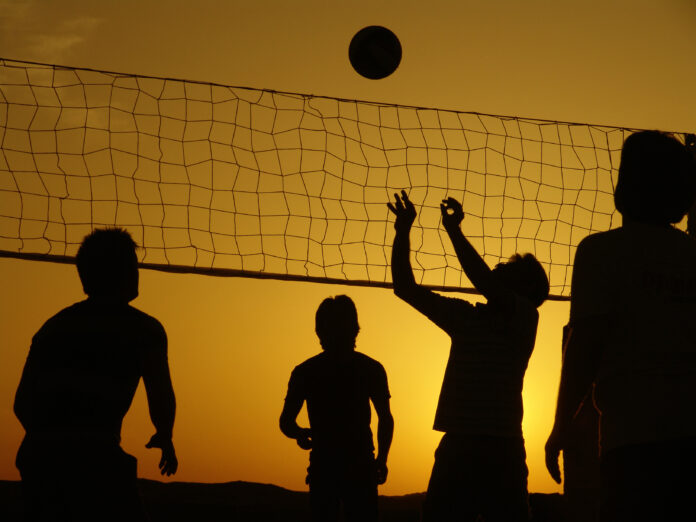 Volleyball Players at Sunset